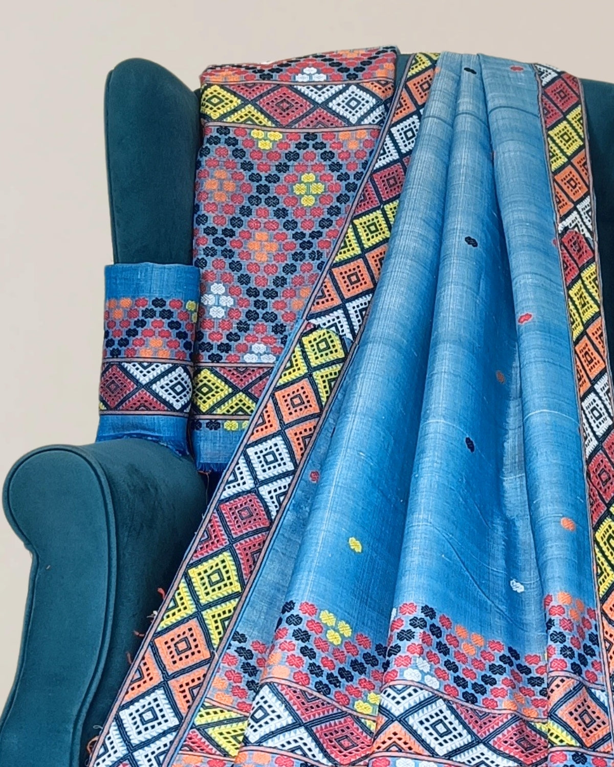 Blue semi nuni Mising mekhela sador - DMC motifs