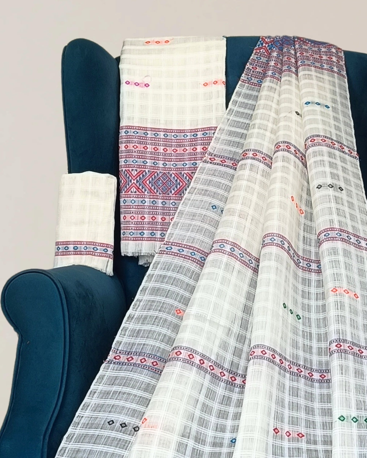 Gero design white semi nuni Mising mekhela sador