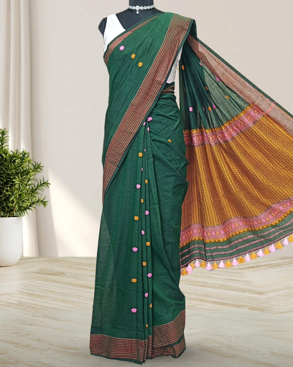 Bottle green pure cotton saree with designer motifs