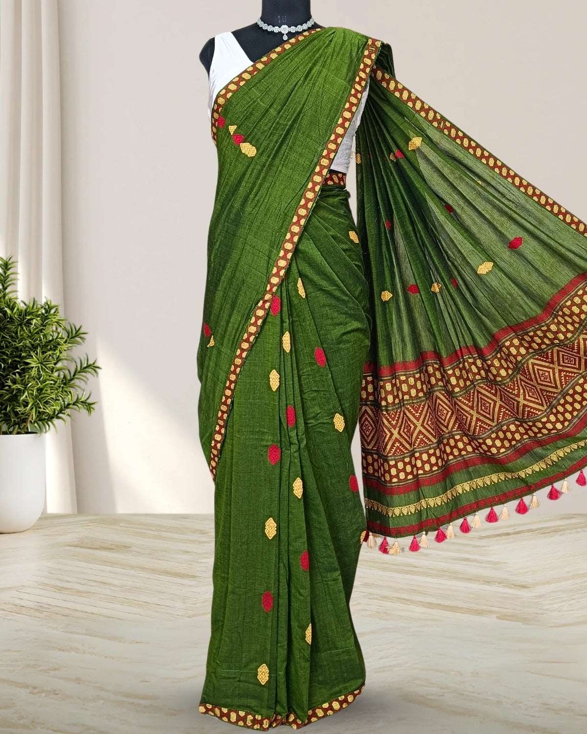 Green pure cotton saree with designer motifs