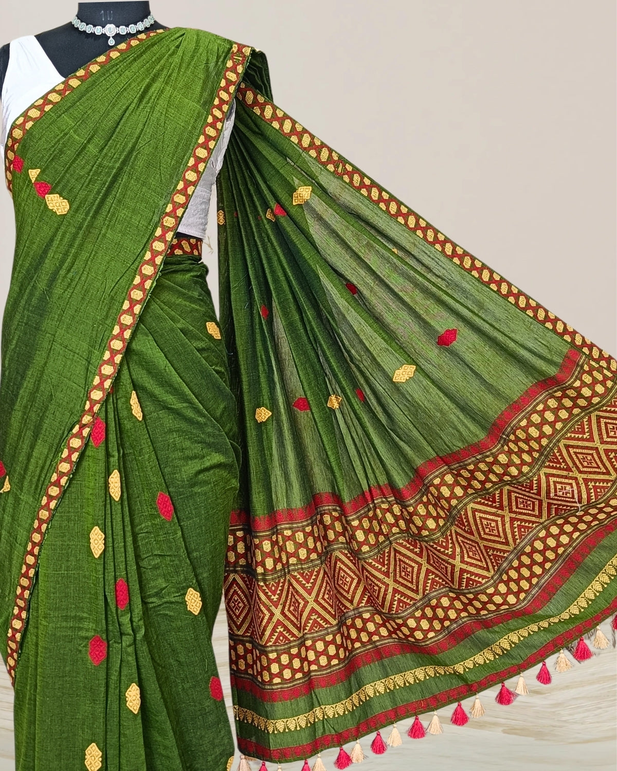 Green pure cotton saree with designer motifs