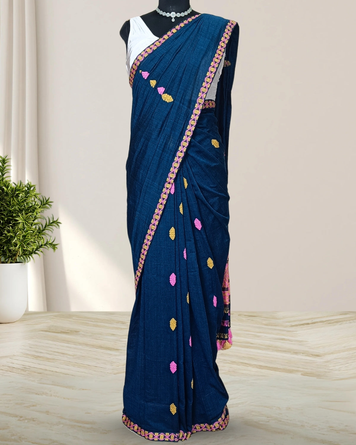 Teal green pure cotton saree with designer motifs
