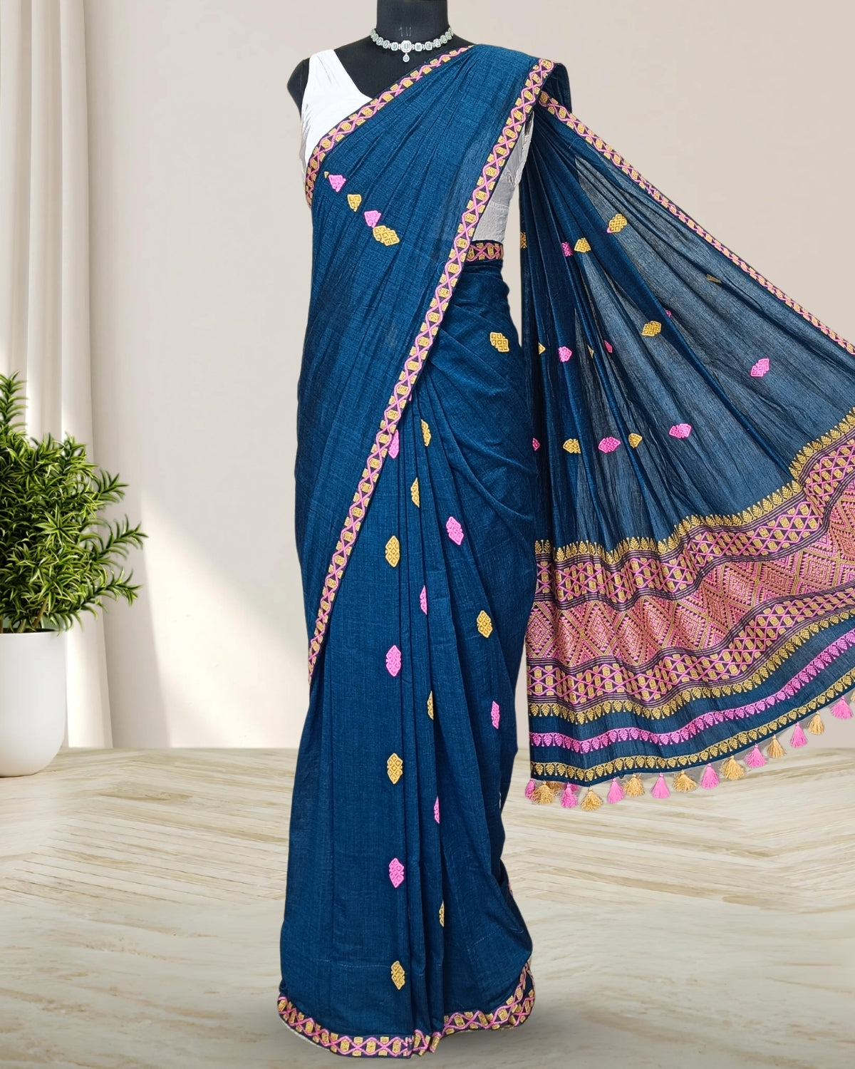 Teal green pure cotton saree with designer motifs