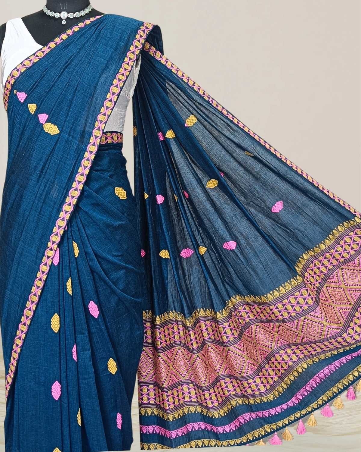 Teal green pure cotton saree with designer motifs