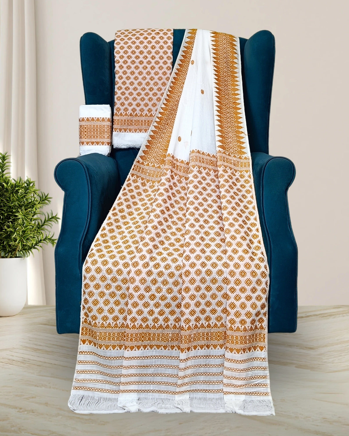 White padmini cotton mekhela sador with designer motifs
