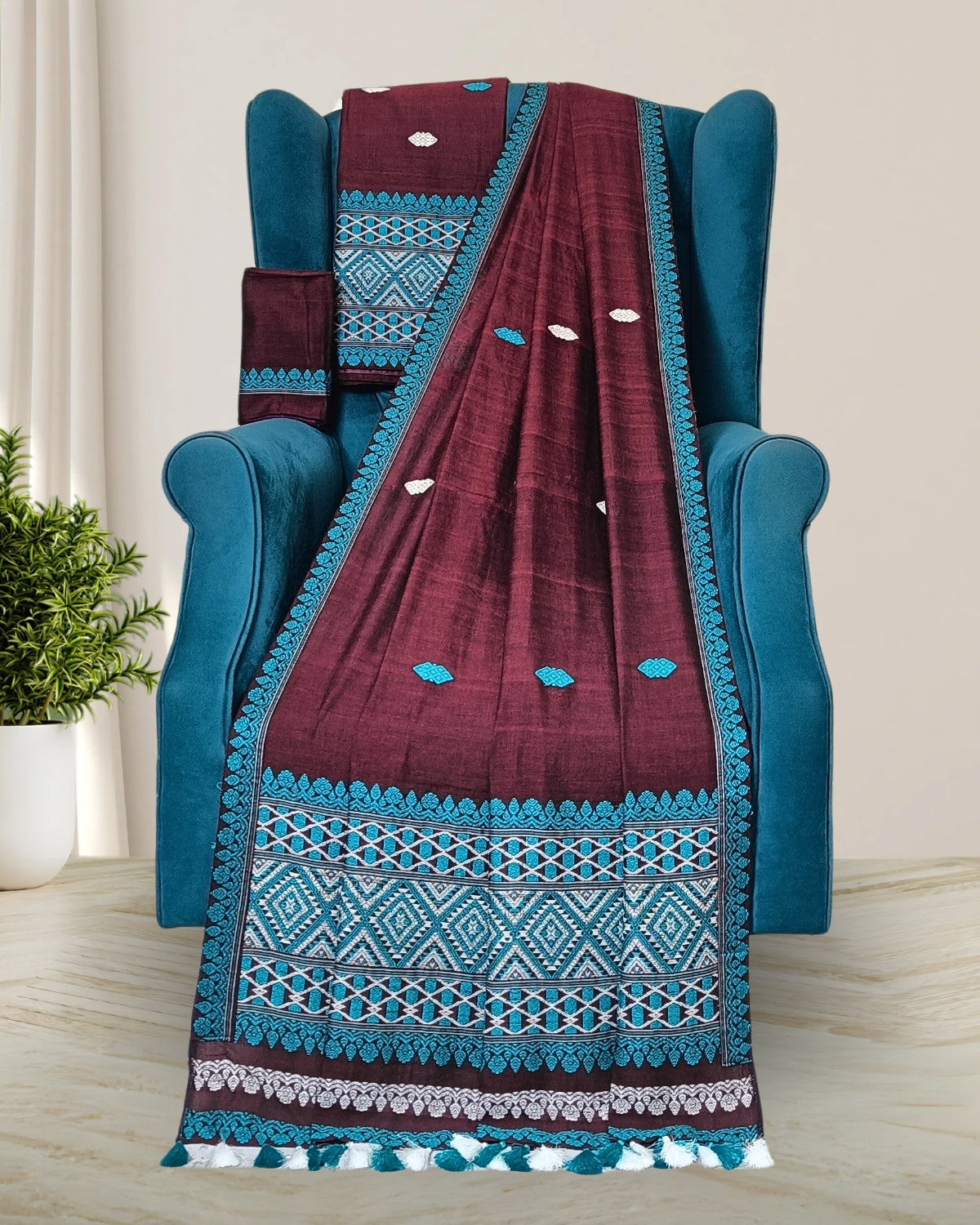 Maroon pure cotton mekhela sador with designer motifs