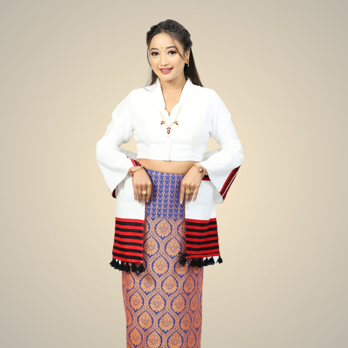 A girl wearing tribal design wrapper (mekhela) or gale