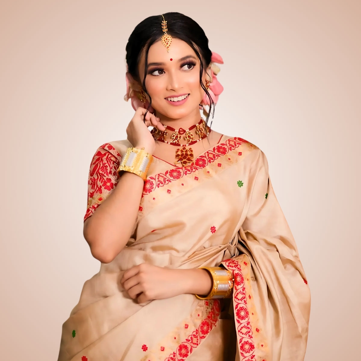 Woman wearing Tussar silk Assamese mekhela sador