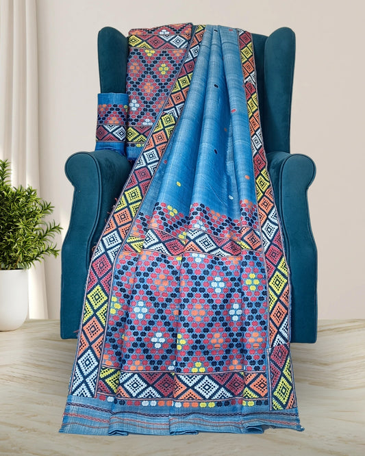 Blue semi nuni Mising mekhela sador - DMC motifs