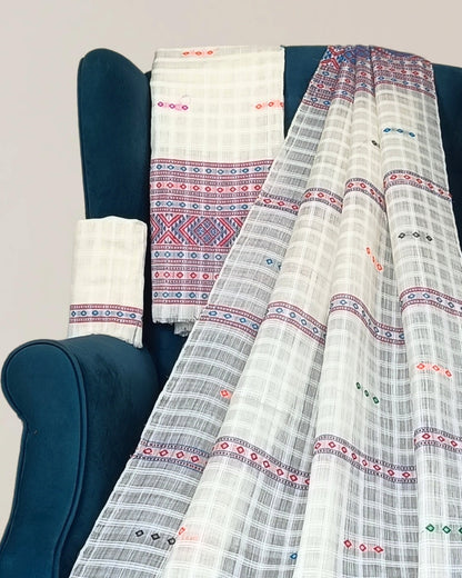 Gero design white semi nuni Mising mekhela sador