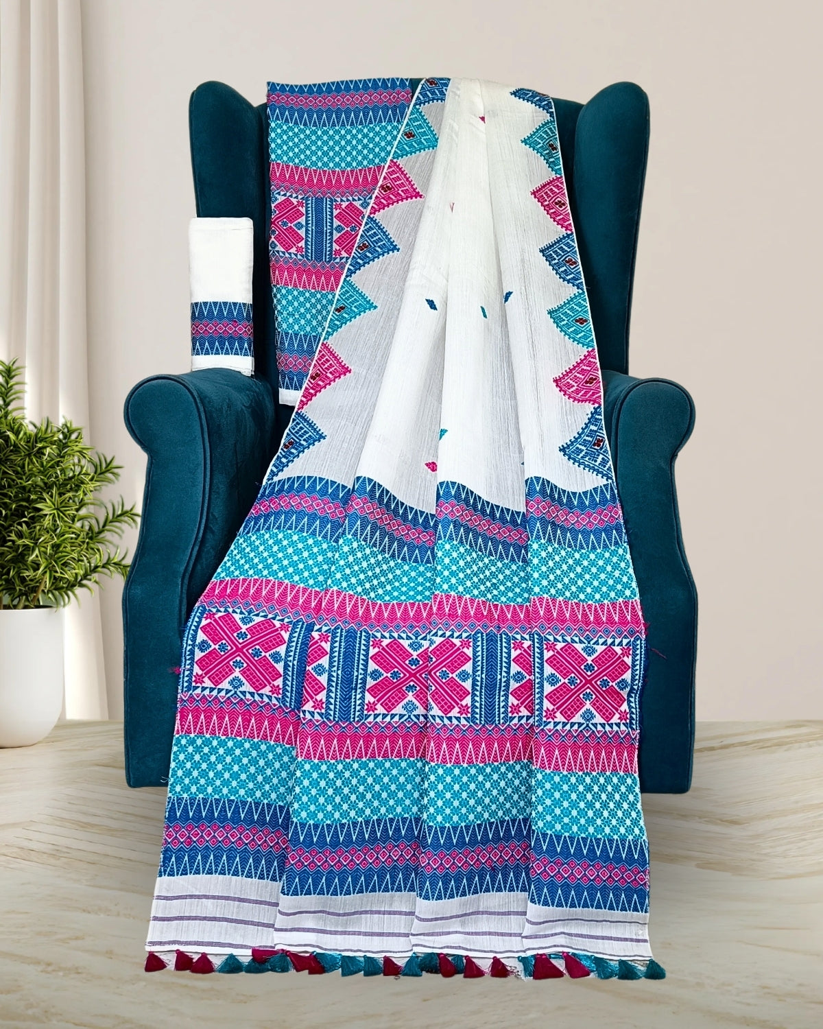 White semi nuni Assamese mekhela sador with designer motifs