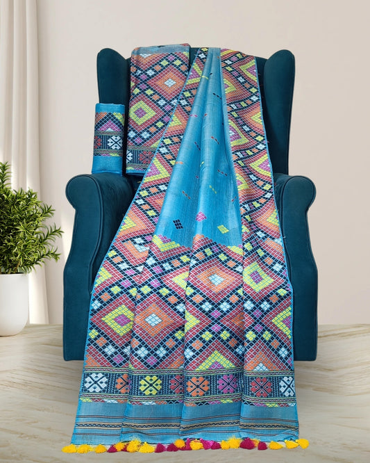 Sky blue semi nuni Mising mekhela chadar - DMC motif work