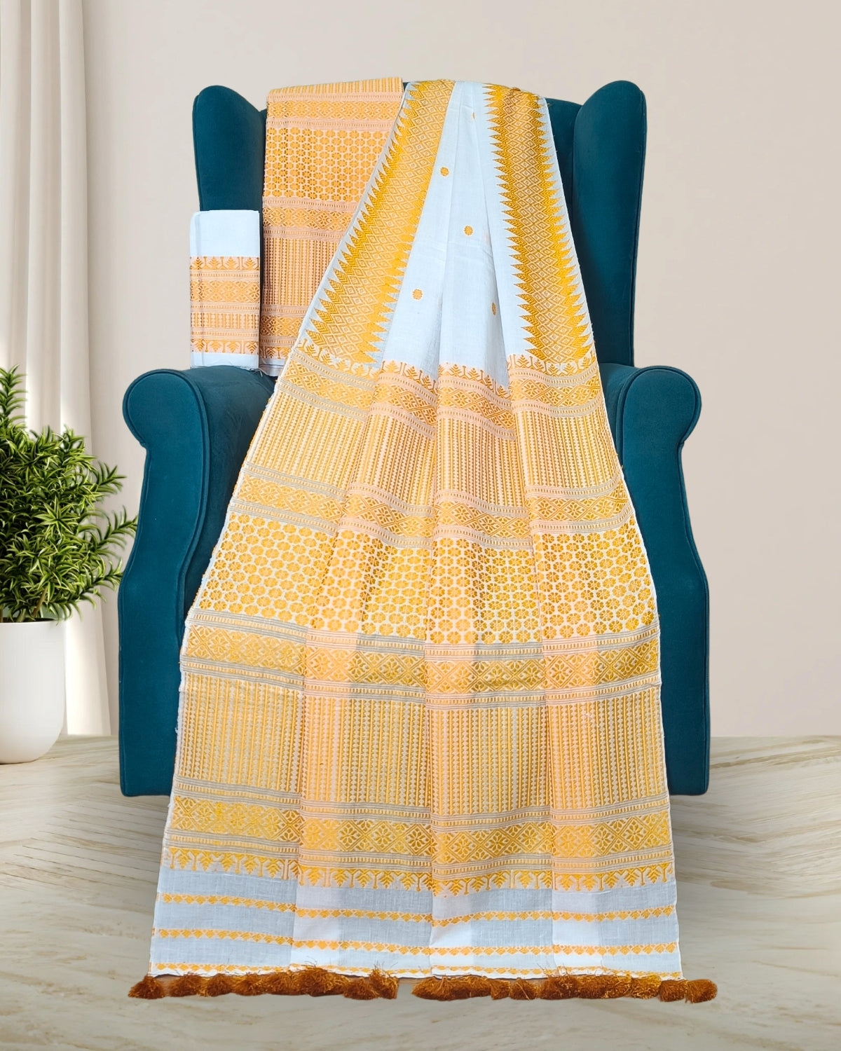 White padmini cotton mekhela sador with designer motifs
