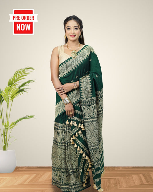 Woman wearing Assamese mekhela sador with designer motifs