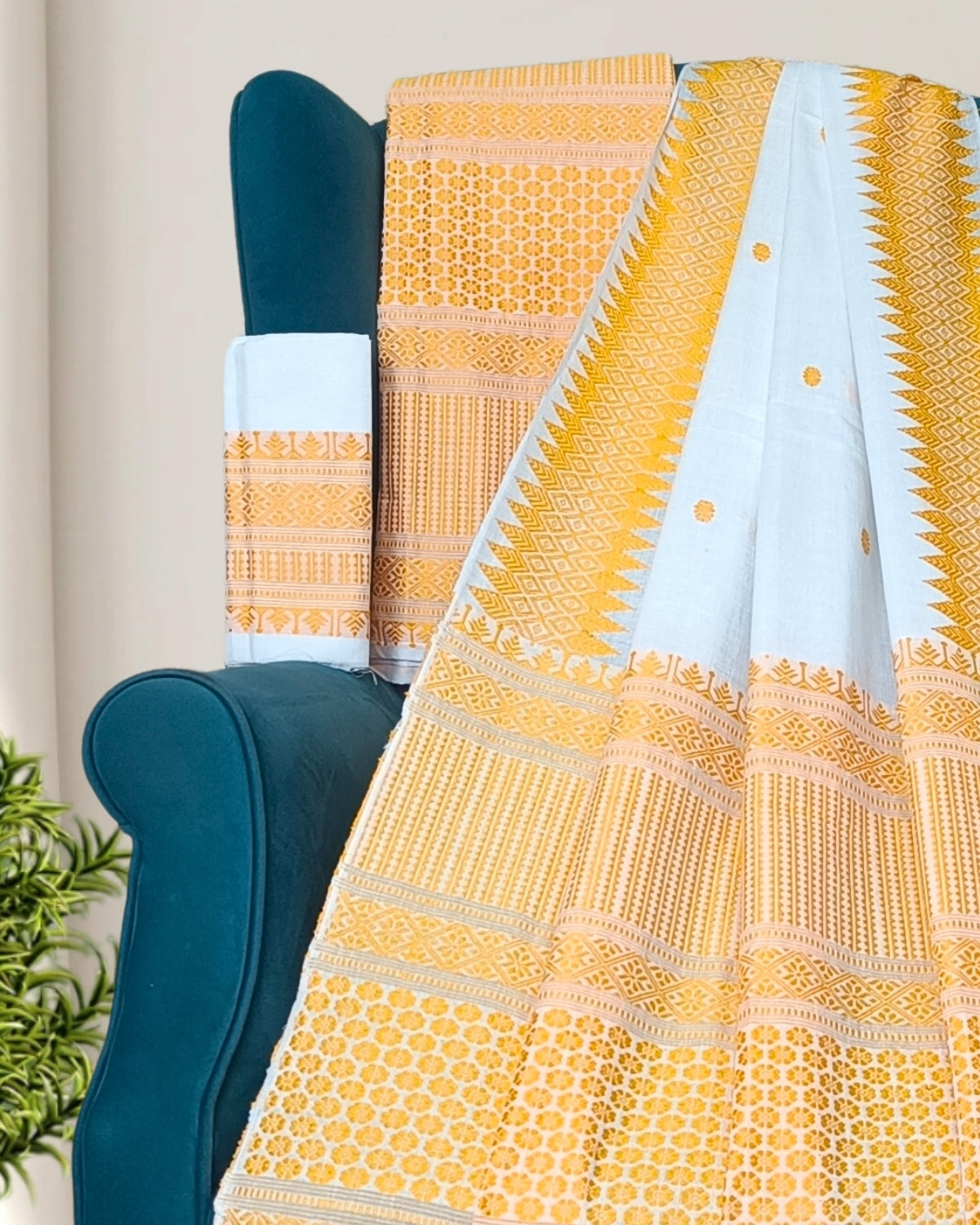 White padmini cotton mekhela sador with designer motifs