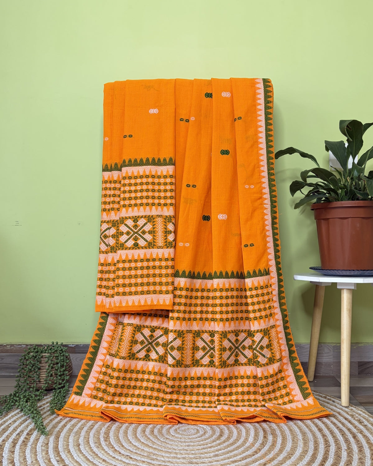 Yellow padmini cotton mekhela sador with designer motifs