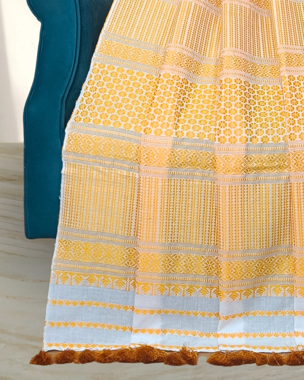 White padmini cotton mekhela sador with designer motifs