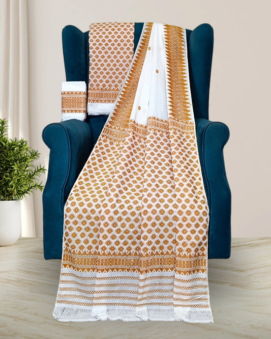 White padmini cotton mekhela sador with designer motifs