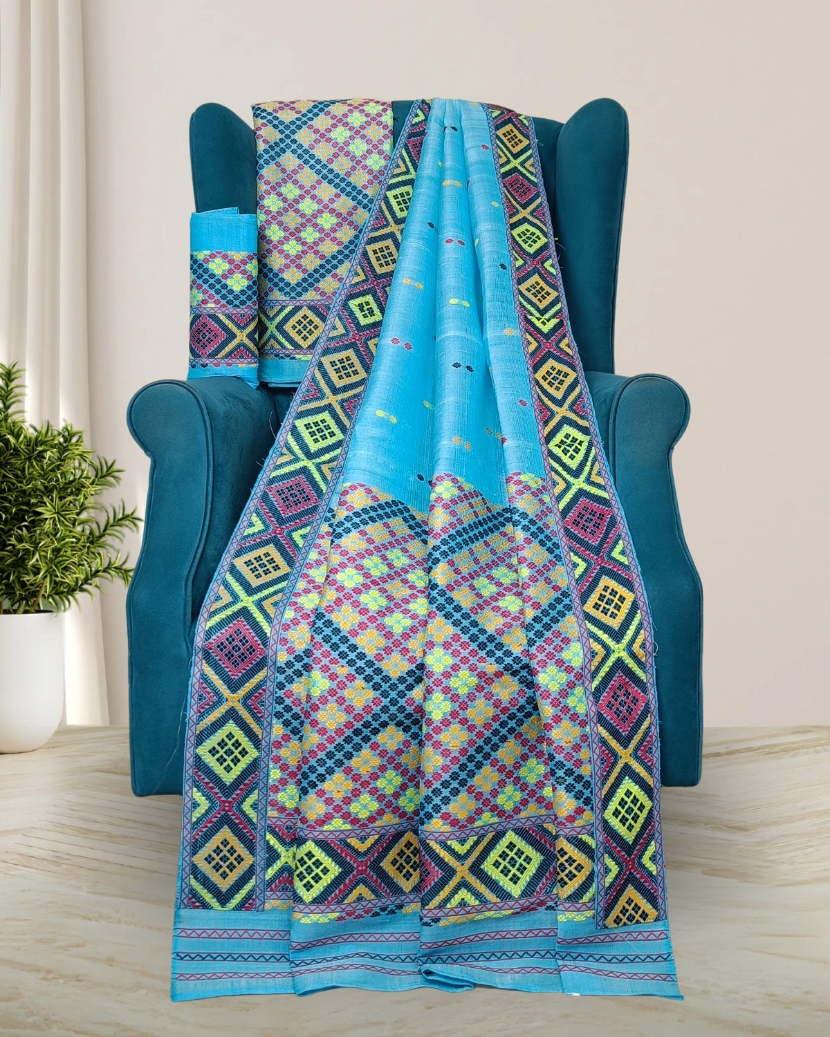 Blue semi nuni Mising mekhela sador - DMC motifs
