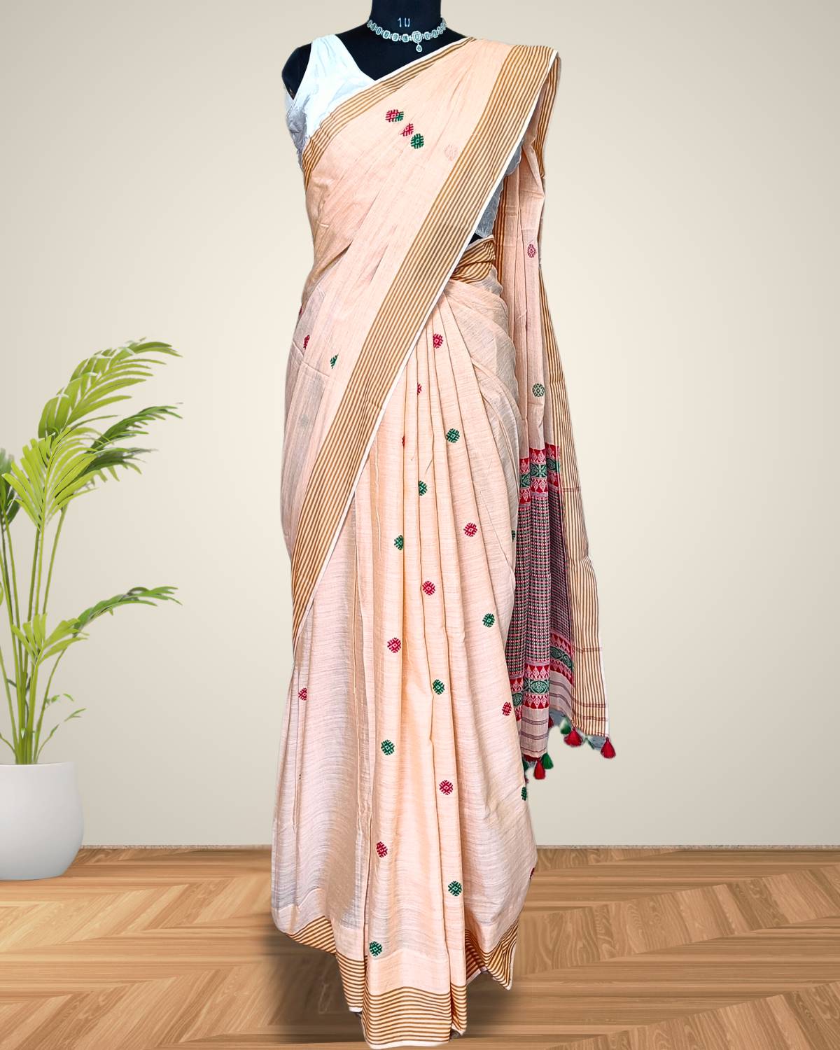 Cream white pure cotton saree with designer motifs