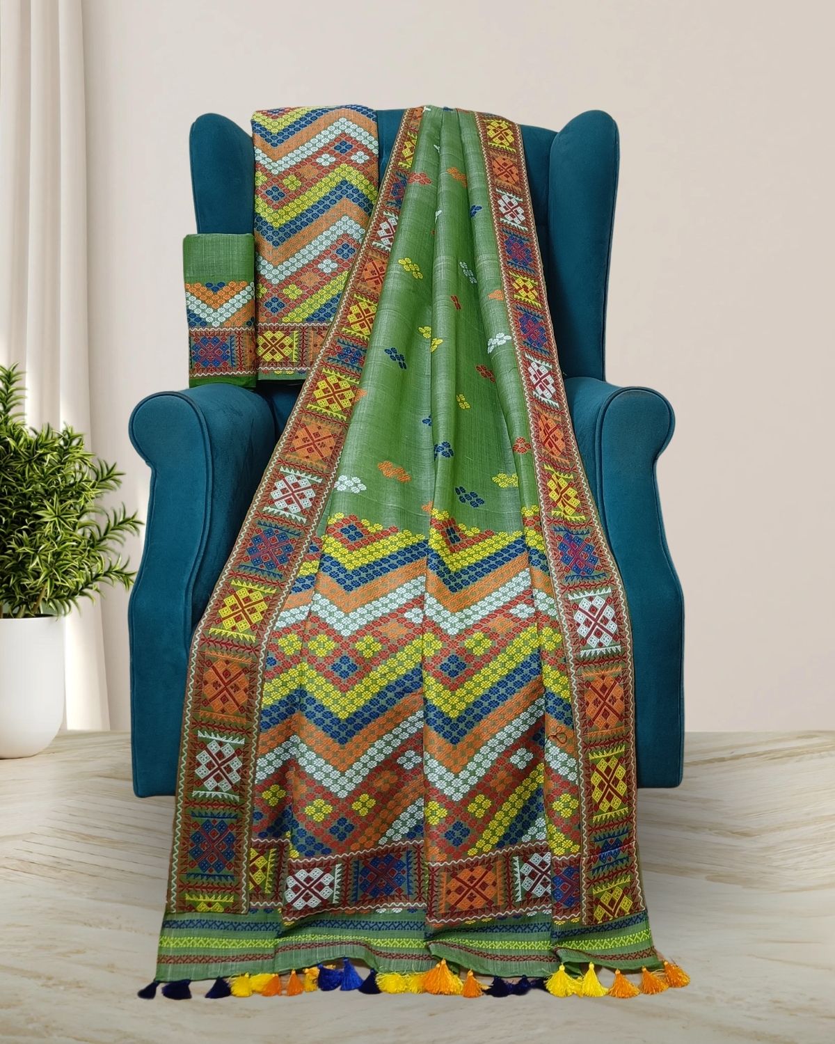 Green semi nuni Mising mekhela sador- DMC motifs