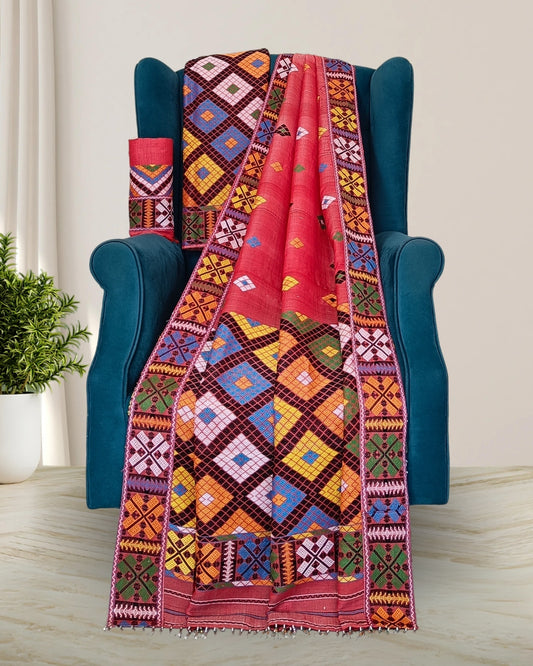Red semi nuni Mising mekhela sador - DMC motif work