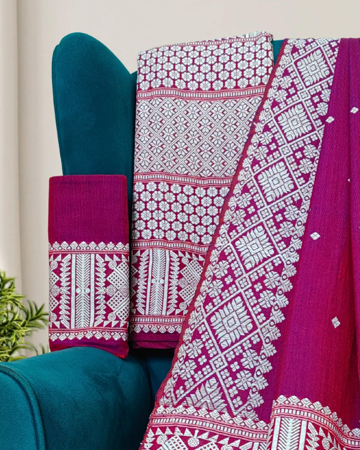 Raspberry pink padmini cotton mekhela sador with designer motifs